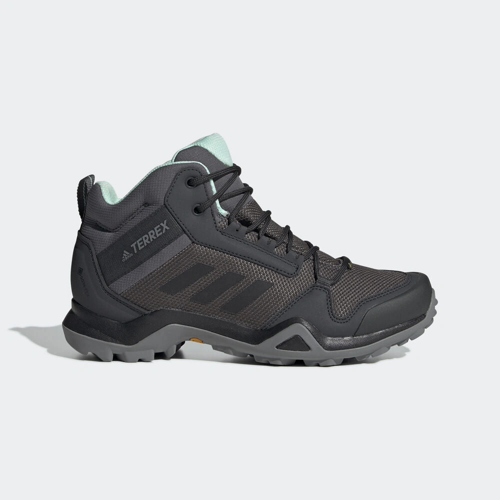 Adidas TERREX AX3 Mid GTX Femme: Randonnée alpine? Votre alliée discrète, légère et imperméable!